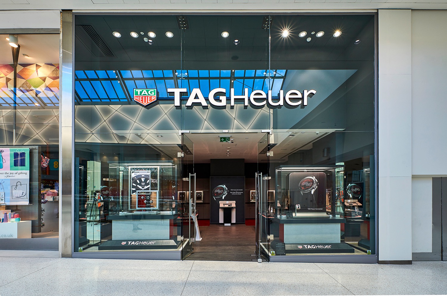 TAG Heuer shopfront viewed directly from a shopping-centre concourse